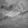 Smoke rises from an explosion at an unknown location, during what U.S. Central Command (CENTCOM) says are strikes on Iran, in this screen grab taken from a handout video released on July 18, 2026. 