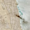 A satellite image shows smoke billowing near an oil facility in Ahmadi Governorate, Kuwait, July 18, 2026.