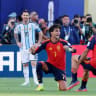 Soccer Football - FIFA World Cup 2026 - Final - Spain v Argentina - New York/New Jersey Stadium, East Rutherford, New Jersey, US - July 19, 2026 Argentina's Lionel Messi looks dejected after the match as Spain's Ferran Torres and Mikel Oyarzabal celebrate winning the World Cup