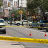 Police investigating the area of the shooting in Tucson, Arizona. 