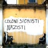 Anne Frank and Primo Levi mural by  aleXsandro Palombo vandalized in Milan.