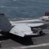 Flight operations aboard the USS George H.W. Bush, at an unknown location, released July 14, 2026, in this still image taken from a handout video.