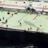 US Marines carry out a verification boarding of the tanker Wen Yao in the Gulf of Oman, in this screengrab obtained from a handout video released July 16, 2026. 