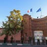 Iranian security forces stand guard in front of the French embassy in Tehran during a protest by supporters of Mahdieh Esfandiari, an Iranian woman who was arrested in France in February on October 21, 2025.