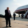 US President Donald Trump points at the new Air Force One, a plane gifted by the Qatari government, before boarding the plane, at Joint Base Andrews, Maryland, US, July 1, 2026. 