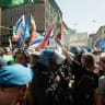  Demonstrators gather as tensions rise against the Jewish brigade during a rally for the commemoration of the Liberation day where armed forces blocked the streets on April 25, 2026 in Milan, Italy. 