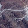 A satellite view shows tunnel entrances at Pickaxe Mountain, of the Natanz nuclear facility, near Natanz, Iran, June 30, 2026.