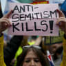 A protester holds a sign that reads ‘Anti-Semitism Kills!’ during the ‘Britain Stands With British Jews’ rally at Downing Street in May in London, England. Antisemitic incidents have risen dramatically against Jews globally and in the United States and violence has become once again part of Jewish l