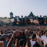 Festival goers look towards the mainstage during the opening day of the 20th Tomorrowland electronic music festival in Boom, Northern Belgium, on July 17, 2026. 