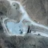 Una imagen de satélite muestra vehículos en una de las entradas a los túneles de Pickaxe Mountain, pertenecientes a la instalación nuclear de Natanz, cerca de Natanz (Irán), el 21 de junio de 2026.