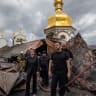 Ukraine's President Volodymyr Zelenskiy and Ukrainian Prime Minister Yulia Svyrydenko visit the Dormition Cathedral of the Kyiv Pechersk Lavra, which was hit during Russian missile and drone strikes, amid Russia's attack on Ukraine, in Kyiv, Ukraine June 15, 2026.