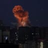 An explosion over the city during a Russian missile and drone strike, amid Russia's attack on Ukraine, in Kyiv, Ukraine July 6, 2026. 