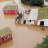 A drone view shows flooded houses after heavy rainfall from a weather front caused flooding and led the Chilean authorities to declare a state of emergency, in La Serena, Chile, July 20, 2026. 