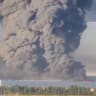 Smoke billows from a warehouse, after deadly Ukrainian drone attacks, as per regional governors, in Elektrostal, Moscow Region, Russia, July 18, 2026, in this screen grab obtained from a social media video. 