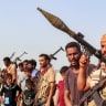  Fighters supporting the Aden-based internationally-recognised Yemeni government gather during a vigil along the Red Sea shore in Khokha, in Yemen's western Hodeidah province on July 20, 2026, calling for a resumption of hostilities with the Huthi group currently controlling the capital Sanaa.