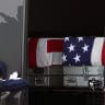 A door marshaller closes the door as the transfer cases containing the remains of U.S. Army 1st Lt Typer James Feehan and U.S. Army Staff Sgt. Michael Emmanuel Swinton arrive at Dover Air Force Base during a dignified transfer for military casualties of the war with Iran on July 22, 2026.