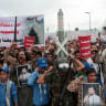 A demonstrator holds up a mock missile as Houthi supporters rally against the Saudi-led coalition's restrictions on Houthi-controlled areas, which the group describes as a blockade, in Sanaa, Yemen, July 17, 2026.