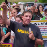 Troy Jackson, Democratic candidate for U.S. Senate, speaks during a demonstration outside of a federal immigration office, on July 14, 2026, in Scarborough, Maine.