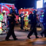 Police officers walk, as emergency responders work on the site, after the annual Berlin's Christopher Street Day Pride parade was called off, after a car crashed into the crowd at Tiergarten park, leaving several people injured, in Berlin, Germany, July 25, 2026.