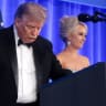 US President Donald Trump, with incoming White House Correspondents' Association (WHCA) President and Fox News Senior White House Correspondent Jacqui Heinrich, takes the lectern to deliver remarks at the WHCA Dinner, in Washington, DC, US, July 24, 2026. 