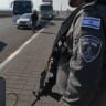 Illustrative: Police officers guard at a police checkpoint on Highway 90 not far from the Israeli border with Lebanon, October 11, 2024.