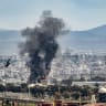 Smoke rises from the oil refineries in Haifa following a missile strike fired from Iran, in northern Israel, March 30, 2026