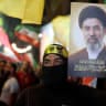 A supporter of Iran-backed terrorist group Hezbollah, holds a portrait of Iran's supreme leader Mojtaba Khamenei during an anti-US and anti-Israel protest in Beirut's southern suburbs on June 10, 2026.