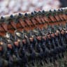 China's Information Support Force (ISF) personnel march during a military parade to mark the 80th anniversary of the end of World War Two, in Beijing, China, September 3, 2025.