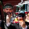 A person holds an image of New York City Mayor Zohran Mamdani during a rally organised by "End Jew Hatred" in opposition to him in New York City, US, July 26, 2026. 