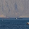 Ships and tankers in the Strait of Hormuz off the coast of Musandam, Oman, April 18, 2026.