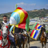 Druze horsemen and cattle growers from the four Golan Heights Druze villages of Majdal Shams, Ein Qiniyye, Buq’ata and Mas’ade parade through the Golan Heights ahead of the Eid al-Adha festival this week, in Majdal Shams, Golan Heights, May 23, 2026.