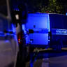 Forensic pathologist van at an allotment garden complex in the Berlin suburb of Spandau after a known Islamist, suspected of ramming a minivan into a crowd near Berlin's annual Christopher Street Day Pride parade on Saturday evening, was shot and killed in a police operation, in Berlin, Germany