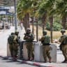 Israeli soldiers at the entrance to the West Bank village of Turmus Aya. June 21, 2023.