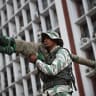 A member of the Bolivarian National Militia holds a Russian-made 9K338 "Igla-S" (SA-18) man-portable air-defense (MANPAD) surface-to-air missile launcher as he takes part in a rally against US military activity in the Caribbean