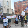Pro-Palestinian activists (left) and pro-Israeli activists (right) are seen outside Hackney Town Hall on July 28, 2026.