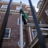 The new national flag of Syria is seen on a flagpole at the former Syrian embassy in Washington, DC on November 14, 2025; Illustrative.