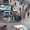 Coal miners and relatives carry the body of a miner after a coal mine collapsed in the Surange area, about 50 kilometres east of Quetta, on July 30, 2026.