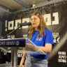 Shir Mathias speaking at a protest in Tel Aviv, August 1, 2026.