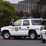 Illustrative:  Kootenai County Sheriff Deputies wait outside the Kootenai County Jail during a plea hearing for Joseph Edward Duncan III, August 23, 2005 in Coeur D' Alene, Idaho.