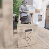 The vandalized statue of the Rambam.