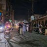 Police personnel cordon off a street following a suicide bombing during a protest in Pakistan's Swat district on August 2, 2026.