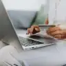 A woman using a laptop to shop online