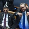 Defense Minister Israel Katz gestures during a plenum session and a vote on a bill to freeze arrests of haredi draft evaders, in Jerusalem, July 14, 2026