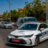 Illustrative: Firemen and police officers at the scene where a car exploded on Peretz Street in Rishon Lezion on July 03, 2022. 