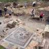 Workers excavate the central floor and bimah of the Great Synagogue in Vilnius, Lithuania, July 22, 2026. (Shira Li Bartov)