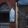 A sign hangs at the site of a suspected arson attack on a former synagogue in London, Britain May 5, 2026.