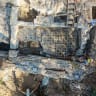 A worker cleans a mosaic floor uncovered during archaeological excavations at Villa Celimontana in Rome, Italy, in this handout image taken on July 30, 2026 and released on August 5, 2026.