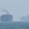 This frame grab taken from AFPTV video footage on July 12, 2026 shows cargo ships anchoring near the Strait of Hormuz; illustrative