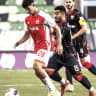 HAPOEL BEERSHEBA midfielder Niv Yehoshua (28) battles for possession during the Southern Reds’ hard-fought 1-0 victory over Red Star Belgrade in the first leg of UEFA Champions League third-round qualifying. 