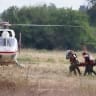 A RESCUE TEAM evacuates a wounded person by helicopter near Sderot on October 7, 2023.